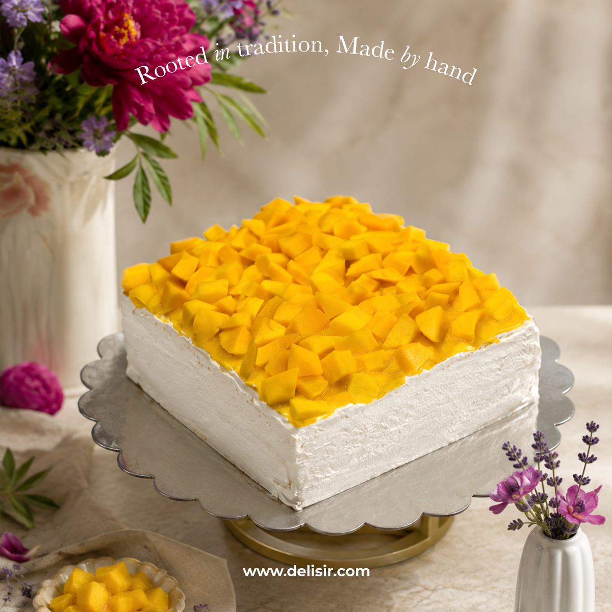 Mango cake topped with fresh mango